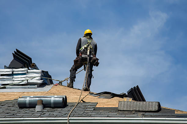 Professional Storm Damage Roof Repair technician working in Anaconda, MT